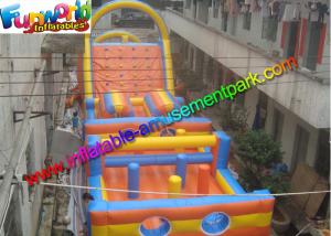 China Sewed Inflatable Outdoor Play Equipment With Climbing Wall For Fun on sale