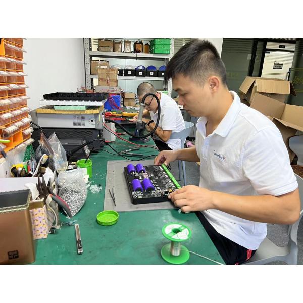 Enerkey engineer is checking energy storage battery smart bms