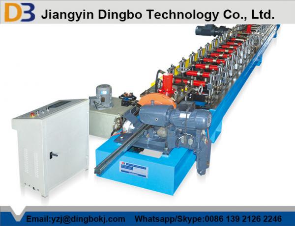 Cheap Colored Steel Roller Shutter Door Roll Forming Machine With Chain Transmission for sale
