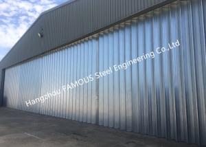 Quality Stable Triangular Seal Vertical Hinged Door Sectional Leaves Folding Sliding Hangar Doors wholesale