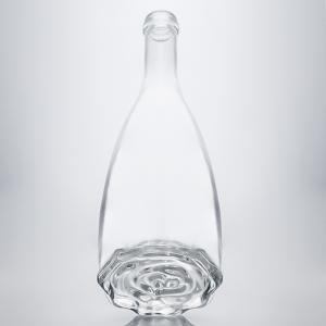 China Embossed Glass Bottle for Gin Rum Vodka Whiskey Sealing Type Cork Flower Shaped Bottom on sale