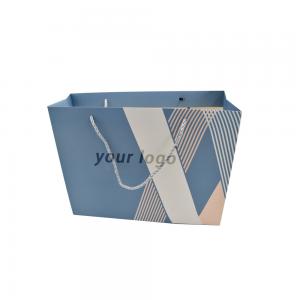 Quality Craft Paper Small Blue Custom Paper Shopping Bags With Ribbon wholesale