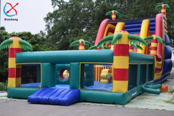 Cheap Customized Giant Inflatable Palm Tree Slides Inflatable Bouncy Castle With Slides for sale