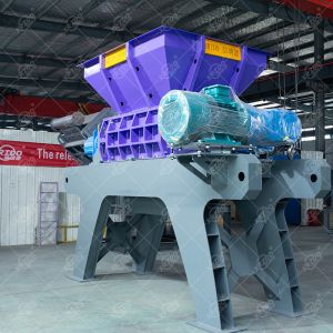 China Industrial Scrap Metal Shredder Recycling Car Shredder Twin Shaft E Waste Scrap Metal  Iron Cans Shredder With Ce on sale