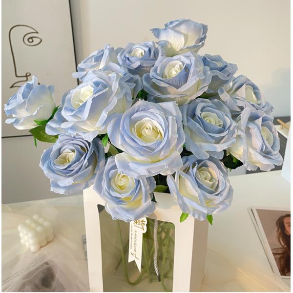 A single broken ice blue rose with a realistic touch for Valentine's Day home decoration shoot, featuring Ecuadorian roses