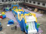 Cheerful blue and yellow giant Inflatable Obstacle Course Rental with basketball