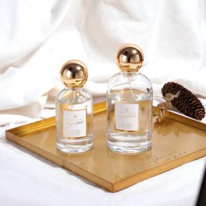 China OEM Empty Round Glass Zamac Gold Luxury Perfume Bottle 50ML 100ML on sale