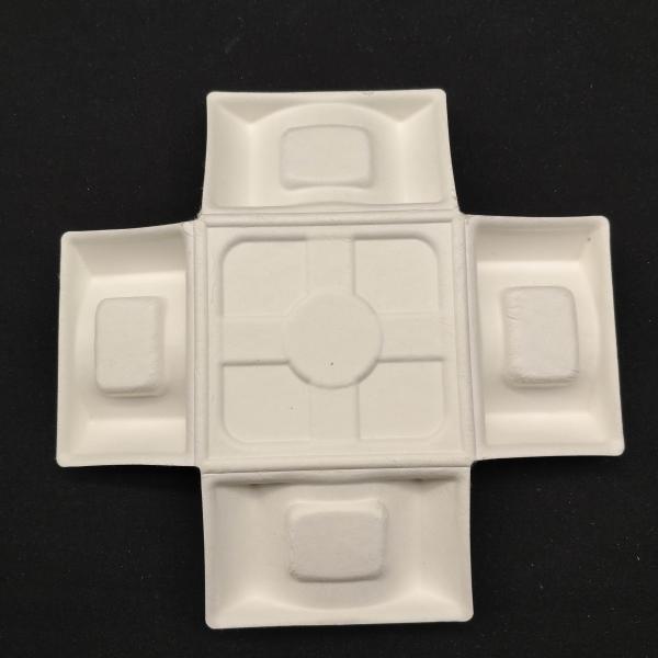 Environmentally friendly white sugarcane bagasse pulp molding with wet pressing for high-end liquor packaging base, featuring embedded bottle bottom