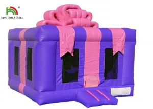 China Customized Pink 4X4m Inflatable Gift Box Blow Up Jumping Castle For Party on sale