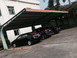 China 4 sets Small Cars Parking Shed Garage Steel Frame With Red Arc Shape Roof Top on sale